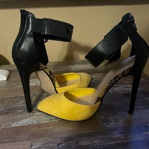Yellow and black snakeskin-like heels
